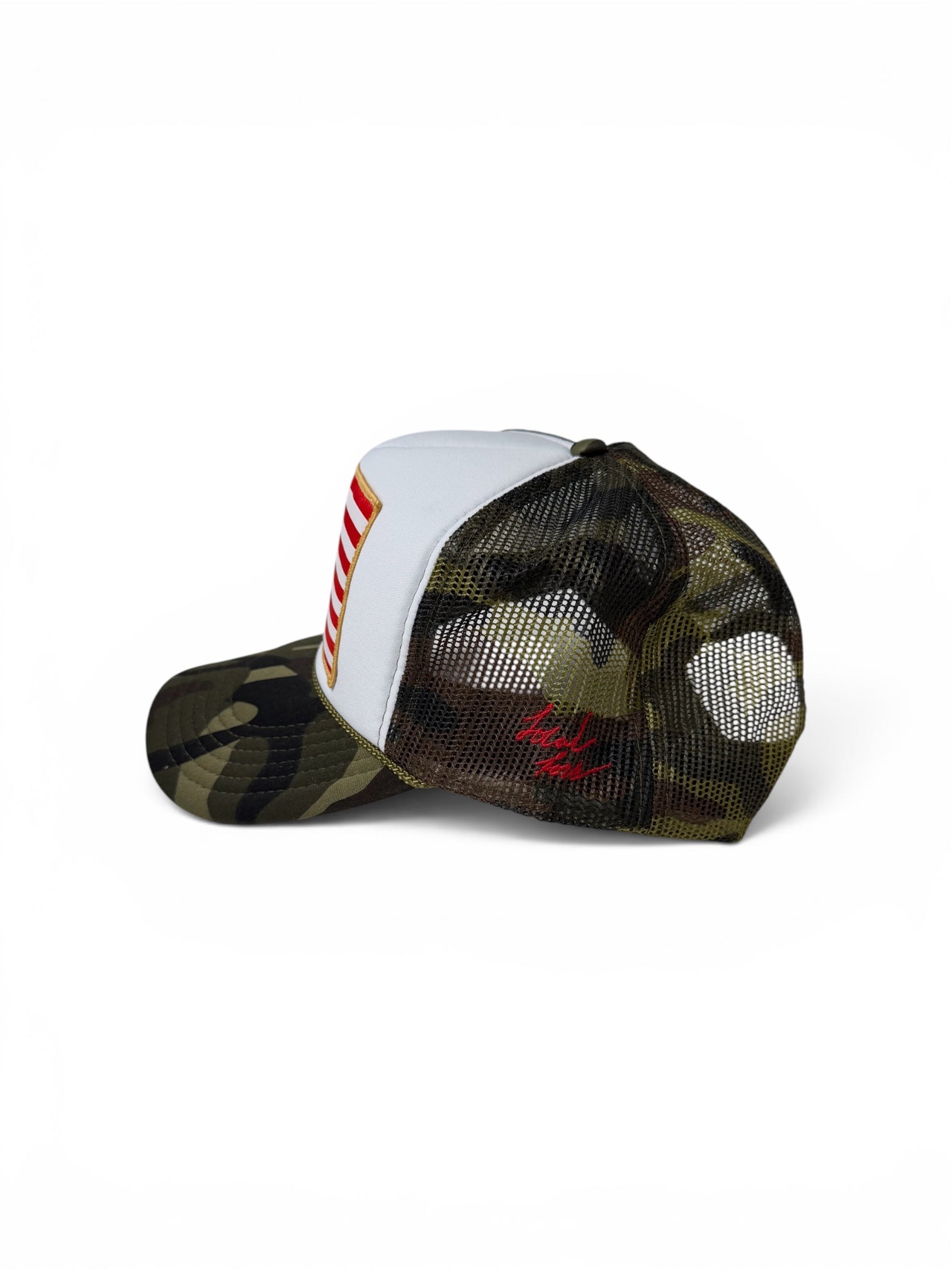American flag patch trucker hat tan side view