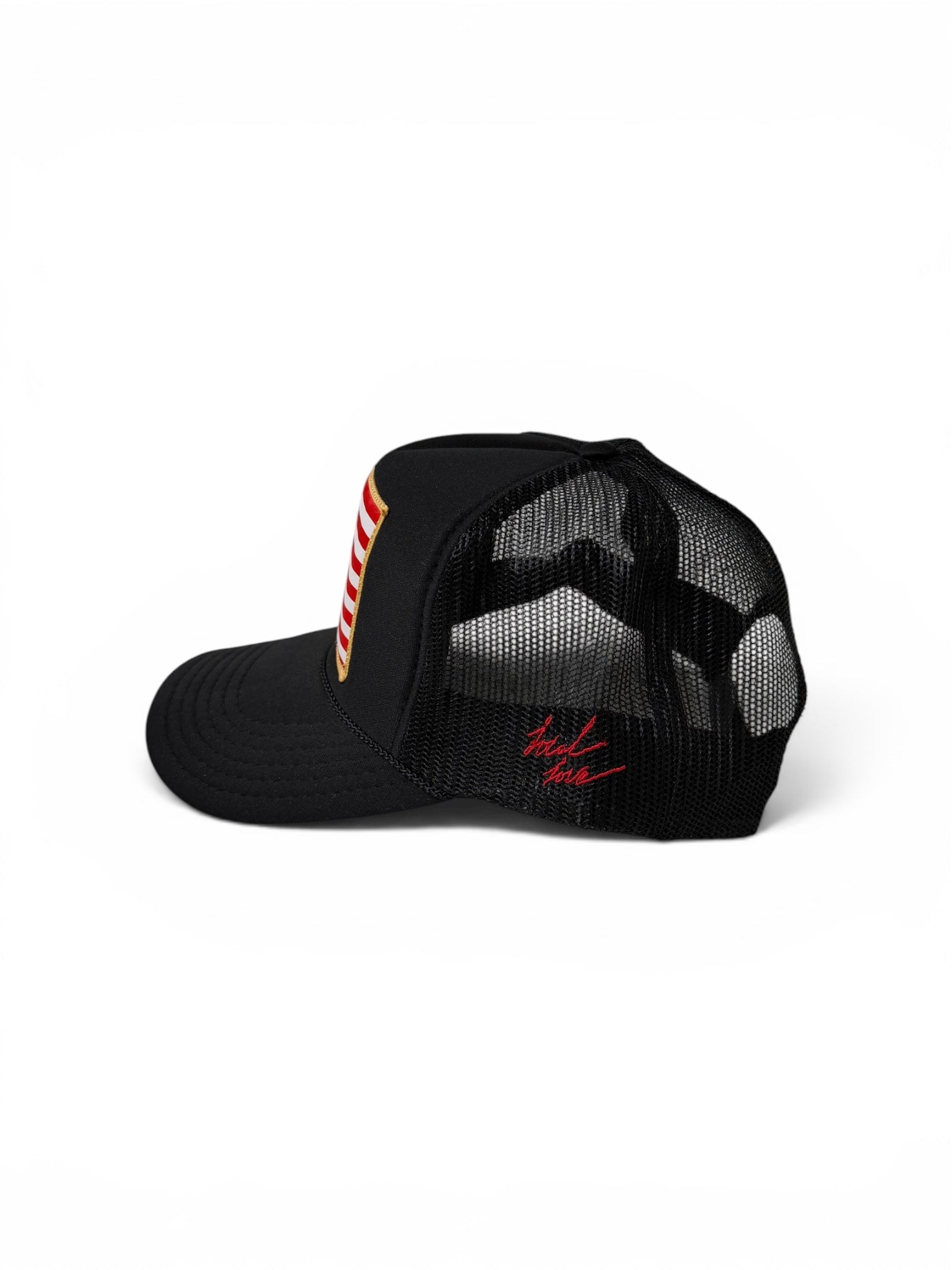American flag patch trucker hat navy side view