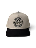Back view of cream snapback cap embroidered with The Happiest